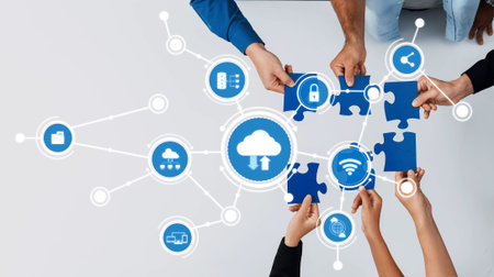 Diverse hands join together to assemble puzzle pieces symbolizing cloud computing and technology,...