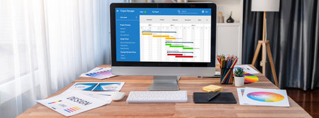 Project planning software for brisk business project management on the computer screen showing...