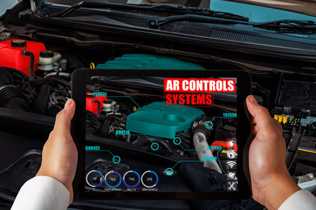 Engineer use augmented reality software to monitor parts of car vehicle with automated application ....