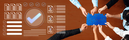 A diverse team collaboratively reviews documents and puzzles on a wooden desk, showcasing teamwork...
