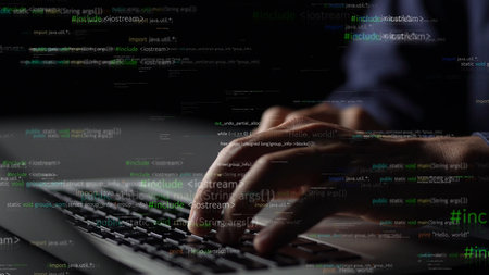 A close-up shot of hands typing on a keyboard while glowing lines of code float in the dark,...