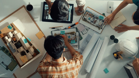 Time lapse of professional architect engineer team writing sticky notes and sticking note at house...