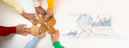 Hands of diverse individuals work together assembling gear shapes alongside a statistical graph,...