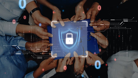 This image captures a diverse group of hands holding a tablet, symbolizing collaboration and...