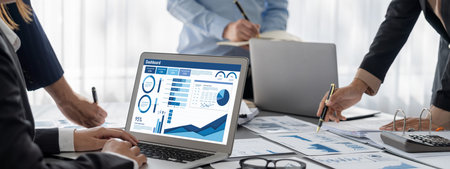 Business intelligence and data analysis concept. Analyst team working on financial data analysis...