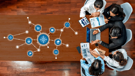 A business team engaged in collaborative planning, analyzing digital marketing strategies with data...