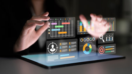 A business professional engages with an interactive holographic data visualization interface, demonstrating innovative analytics technologies and digital insights for strategic analysis.の写真素材