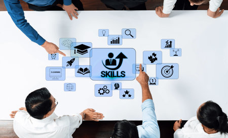 Diverse Business Team Collaborating on Skill Development and Learning Strategies with Icons on a...