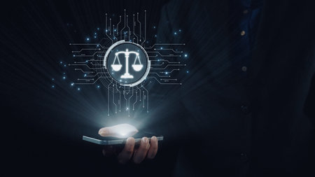 Futuristic digital law interface displaying justice scale, highlighting digital law, AI compliance,...