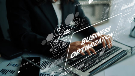 Professional Business Optimization Strategy with Digital Interface and Hands on Laptop Keyboard in...