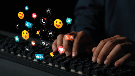 Hands Typing on Keyboard Surrounded by Colorful Social Media Icons Representing Digital...