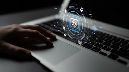 Futuristic technology interface overlay on laptop showcasing digital innovation, data analysis, and...