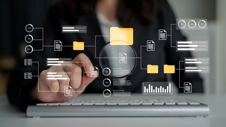 A business professional uses a magnifying glass to analyze digital data and organize files,...