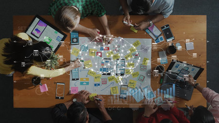 A dynamic brainstorming session where a diverse team collaborates on ideas and strategies using...