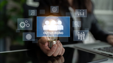 Outsourcing concept showing collaboration, delegation, global workforce, productivity, and task...