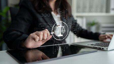 Futuristic digital law interface displaying justice scale, highlighting digital law, AI compliance,...