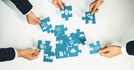 Top view panorama banner of business team assembling jigsaw puzzle over table symbolize business...