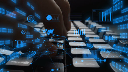 Close-up view of hands typing on a keyboard with an overlay of digital data visualization elements,...