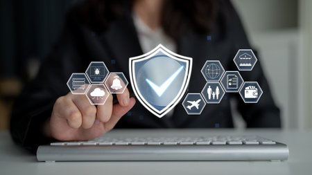 Business professional interacting with cybersecurity icons on a digital interface, showcasing...