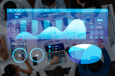 A dynamic business meeting featuring data analysis and visualization, showcasing charts and graphs...