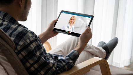 Doctor video call online by telemedicine software application for virtual meeting with patient