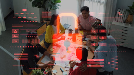 A diverse team collaborates on cybersecurity strategies in a modern workspace, surrounded by tools...