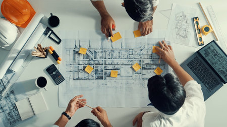 Time lapse of professional interior designer writing at sticky note while planning design with...