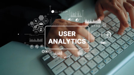 Close-Up View of Hands Typing on a Computer Keyboard with User Analytics Graphics Overlay....