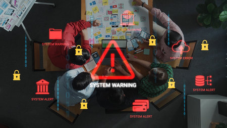 Group of Diverse Individuals Collaborating on a Project with System Warnings and Alerts Displayed on...
