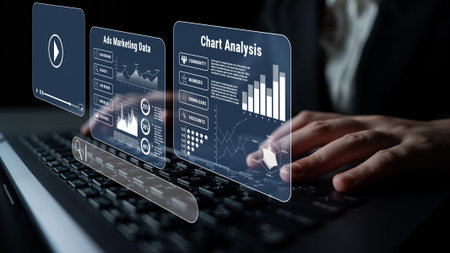 Hands of a Business Professional Analyzing Data on a Laptop with Interactive Graphs and Marketing...