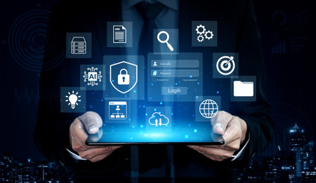A businessman holds a tablet displaying security and data icons, symbolizing modern technology trends and digital innovation against a dark backdrop.の写真素材