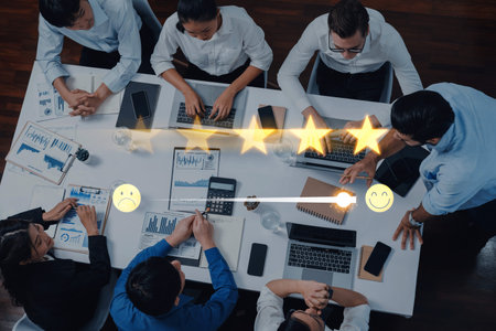 Teams gather around a table to evaluate performance ratings and feedback, utilizing technology and...