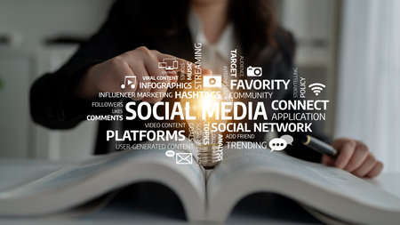 A woman focuses on developing a social media strategy, surrounded by text elements highlighting key...