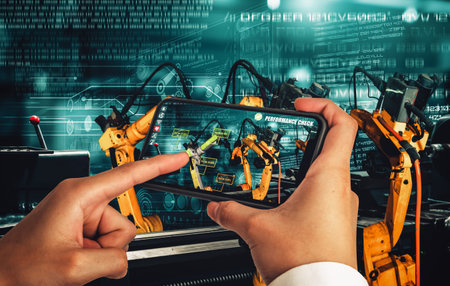 Engineer controls robotic arms by augmented reality industry technology application software. Smart...
