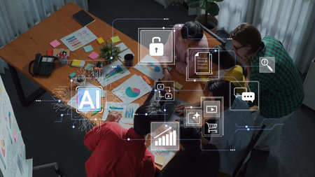 Team Collaboration on AI Project with Data Graphics and Analytical Tools in Modern Office...