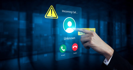 A hand reaching toward an incoming call notification on a digital screen, featuring warning signs...