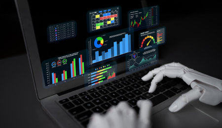 Futuristic robotic hand interacting with data visualization dashboard on laptop screen showcasing...