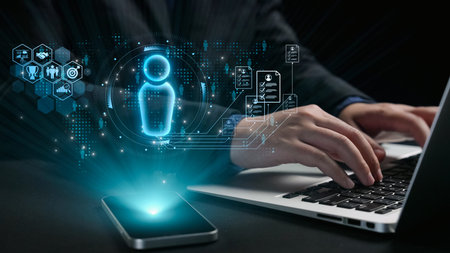 A businessman engages with a laptop, surrounded by holographic digital interfaces representing...