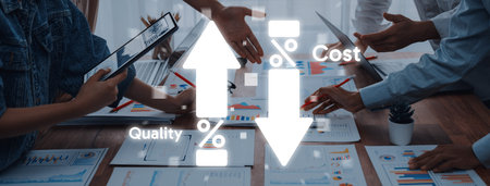 Business professionals engage in a meeting to analyze graphs representing cost and quality,...