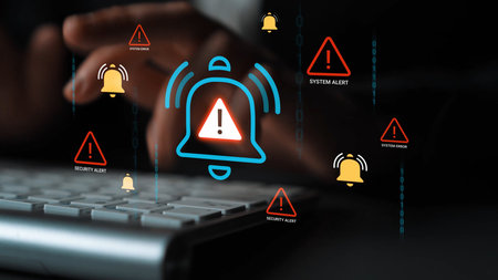System Alert Notification with Warning Icons and Hands on Keyboard, Digital Security Warning,...