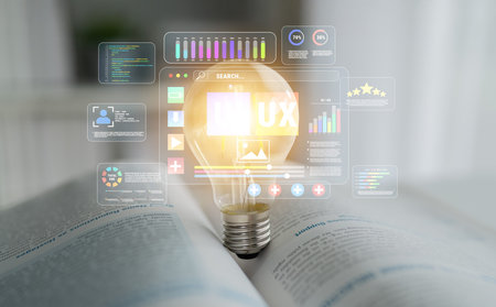 Lightbulb with Digital Interface Representing Innovation and Technology Concepts on Open Book...
