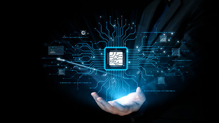 A hand presents a microchip glowing within a web of digital connections, representing the fusion of technology, innovation, and advanced communication in a modern world.の写真素材