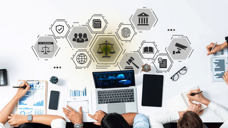 Collaborative Workspace with Legal Icons and Digital Devices Representing Justice System and Law in...