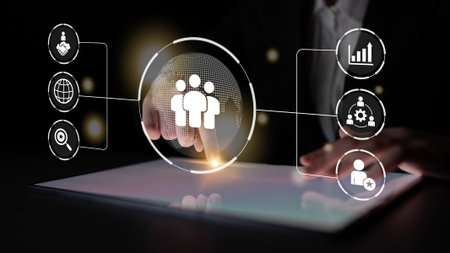 Business teamwork connected around a globe representing cooperation, leadership, and organizational...