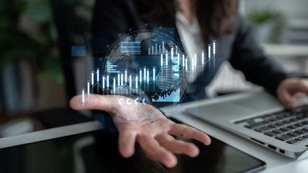 A business professional interacts with holographic technology, displaying financial graphs and data...