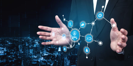 A business professional showcases digital network connections with interactive icons. The image...