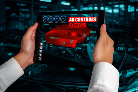 Engineer use augmented reality software to monitor parts of car vehicle with automated application ....