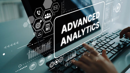 Professional Hands Engaging with Advanced Analytics Technology on Modern Computer Screen Displaying...