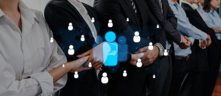 A diverse group of professionals engaged in a teamwork activity, symbolizing collaboration and...