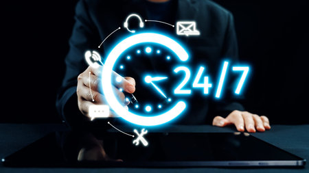A businessperson interacts with a tablet, highlighting the 24 hour availability concept through...